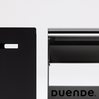 黑色金屬收納推車，有兩層黑色收納籃，側面有長方形開孔，右側框架為銀色，底部印有黑色「DUENDE」品牌標誌。