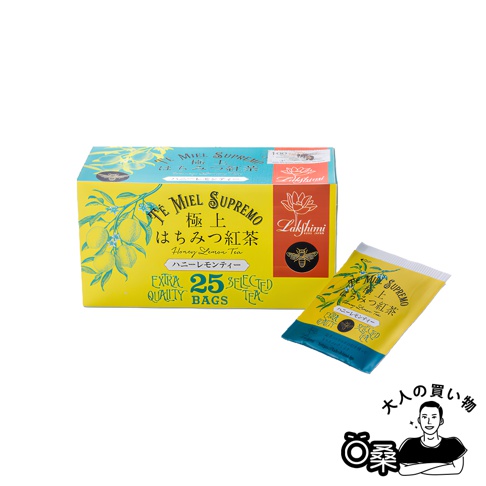 模式B： 一盒與一包黃色包裝的蜂蜜檸檬風味紅茶，包裝上有檸檬和蜜蜂的插畫，以及日文和英文的商品名稱。