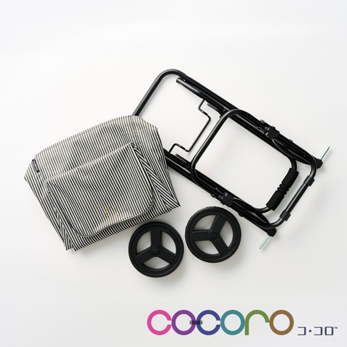 黑白色條紋布製購物袋，搭配黑色金屬摺疊購物車骨架與兩個黑色輪子。