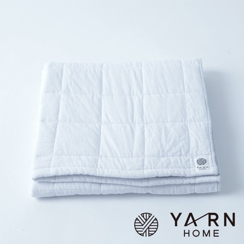 UKIHA 脫脂棉混紗速乾格紋浴巾，白色，格紋織紋，柔軟材質，附有品牌標誌。