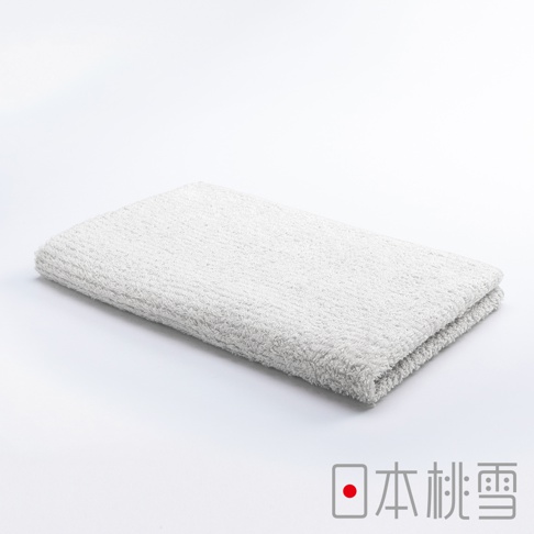今治細絨毛巾，淺灰色，質地柔軟，呈現細緻絨毛感，折疊置於白色背景上。