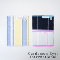 三條Kitchen Mette壓克力纖維無痕清潔巾，左側為藍、黃、白、灰條紋，右側上方為深藍色搭配白色細條紋，右側下方為白色搭配粉色粗細條紋，皆有品牌標籤。