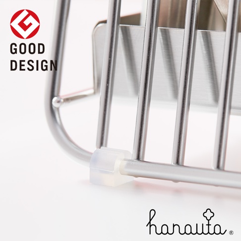 不鏽鋼餐具收納架，具有圓潤的銀色金屬框架和垂直支架，底部有透明的固定件，質感簡約。