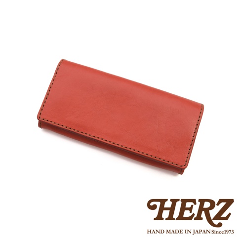 職人手作皮革軟皮長夾 WL-63，此款為紅色，採用柔軟皮革製成，邊緣縫線整齊，設計簡潔。