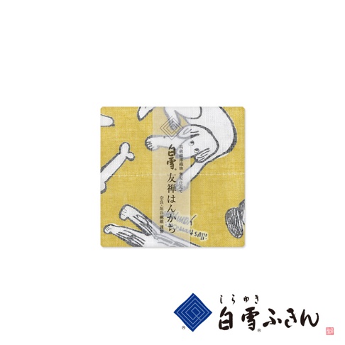 黃色友禪染畫布方巾，印有白色線條勾勒的貓咪和骨頭圖案。布料表面有織紋，中央有一張標示日文「白雪 友禪 はんかち」的透明標籤。