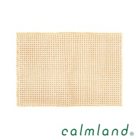 米色鬆餅紋瞬乾吸水浴墊，材質為超細纖維，表面有立體格子紋理，邊緣有流蘇設計。