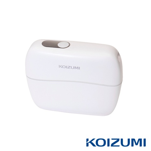 這是一款外觀簡約的白色 KOIZUMI 品牌隨身按摩筋膜槍，機身呈圓潤的長方形，頂部設有圓形電源按鈕，整體設計精緻小巧，並在下方標註有深藍色的 KOIZUMI 品牌名稱。