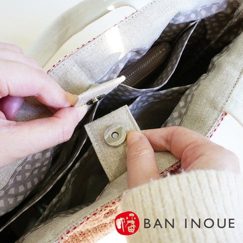 BAN INOUE 品牌標誌與手提袋內部的絨布襯裡和磁扣特寫