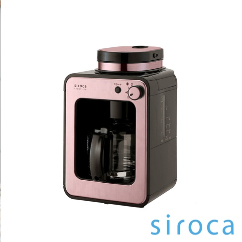 SC-A1210 自動研磨咖啡機，機身主要為黑色，搭配玫瑰金飾邊，設有玻璃咖啡壺，頂部及旋鈕部分亦為玫瑰金色。