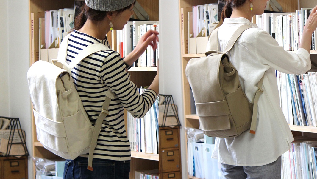 loiter高島帆布前蓋式背包，奶茶色帆布材質，具有前置翻蓋和側邊口袋設計，肩帶為可調節帆布材質。