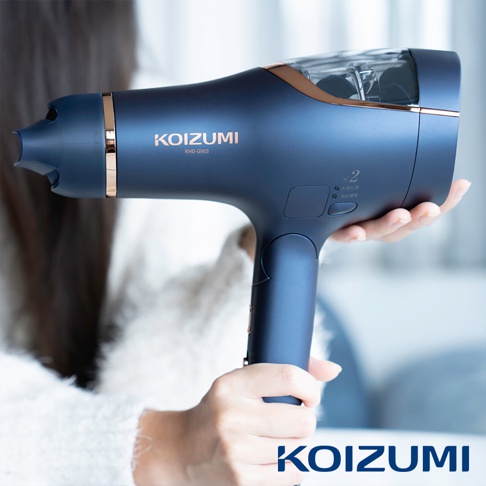 KHD-G903-AE 暴風級雙渦輪負離子吹風機，深藍色霧面機身，搭配玫瑰金飾條，握把處有兩個功能按鈕及指示燈。