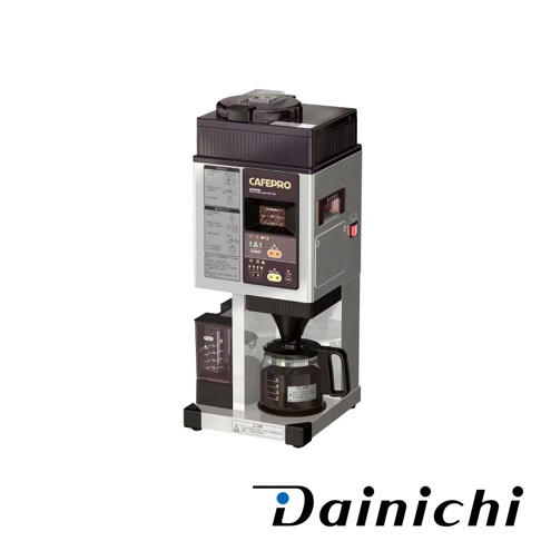 銀色及黑色機身的 CAFEPRO 自動生豆烘焙咖啡機 MC-520A，配有透明咖啡壺，壺內裝有咖啡液，機身側面有水位指示器，面板上有操作按鈕與顯示螢幕，頂部為咖啡豆儲存槽。