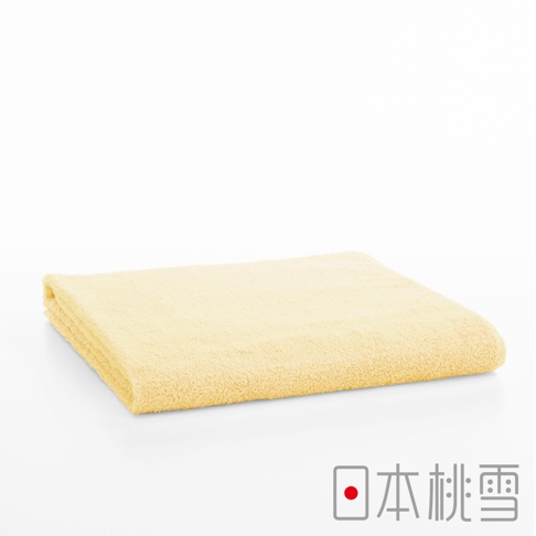 飯店大毛巾，淺黃色，材質柔軟，織紋清晰。