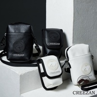 展示兩個黑色和兩個白色高爾夫方形側背包，皆為人造皮革材質，正面有圓形品牌標誌和CREEZAN字樣。