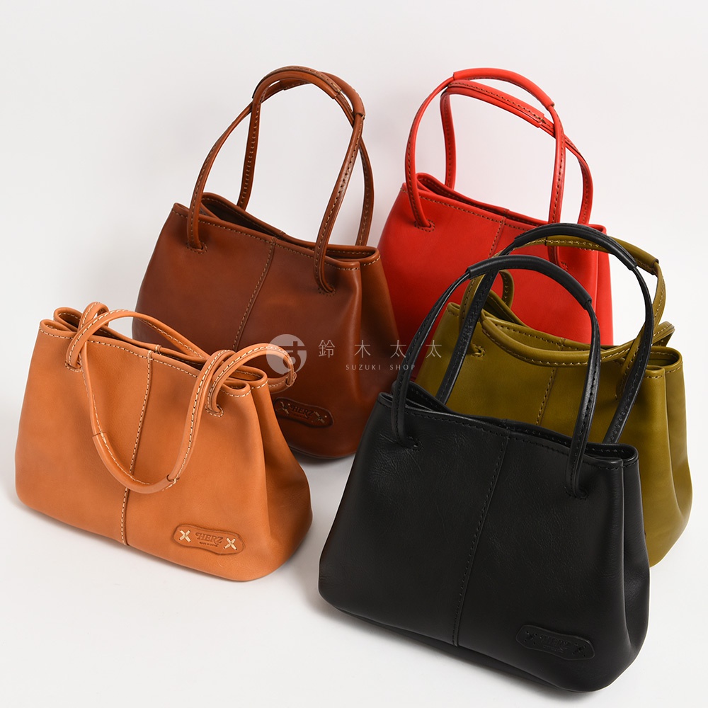 日本HERZ職人手作皮革可調式兩用托特包，共展示四款不同顏色：焦糖棕、酒紅、橄欖綠及黑色。