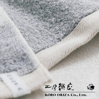 工房織座SUFFICE 棉麻混紡雙色快乾毛巾的近景細節，毛巾紋理清晰可見