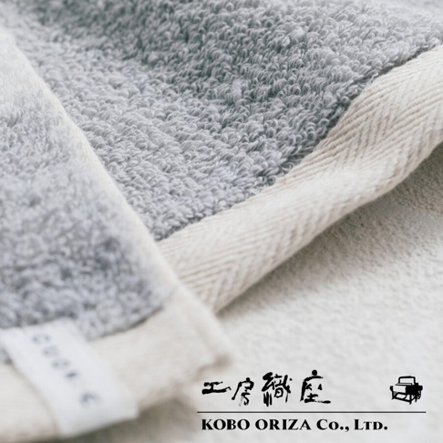 工房織座SUFFICE 棉麻混紡雙色快乾毛巾的近景細節，毛巾紋理清晰可見