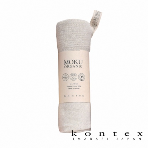 MOKU ORGANIC 有機棉長毛巾，淺米色，材質為 100% 有機棉，尺寸為 33x100 公分，標籤上印有「MOKU ORGANIC」、「MADE IN IMBARI JAPAN」及相關認證標誌。
