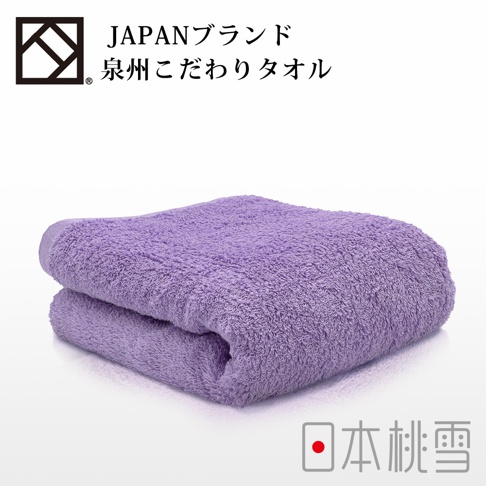 一張疊好的淺紫色加厚毛巾，質感蓬鬆柔軟，毛巾表面有明顯的織紋。