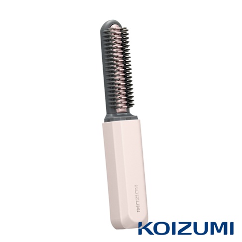 KOIZUMI 品牌 mini 瀏海梳，採用粉嫩色系手柄搭配灰粉色梳齒，設計精巧便於攜帶。