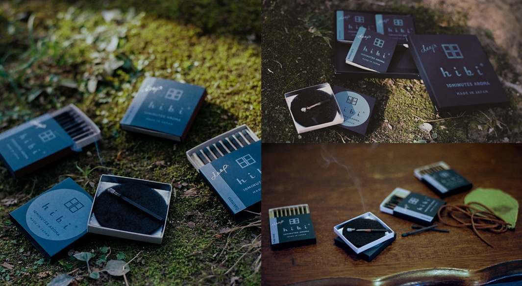 Deep木質調香氛火柴禮盒（3入組），黑色紙盒包裝，內含多支深色香氛火柴，置於淺色底座上，部分火柴已燃燒冒煙，背景為自然綠草地或木質桌面。