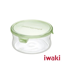 一個圓形透明耐熱玻璃保鮮盒，配有淺綠色塑膠蓋，蓋子上印有「PACK&RANGE」字樣。