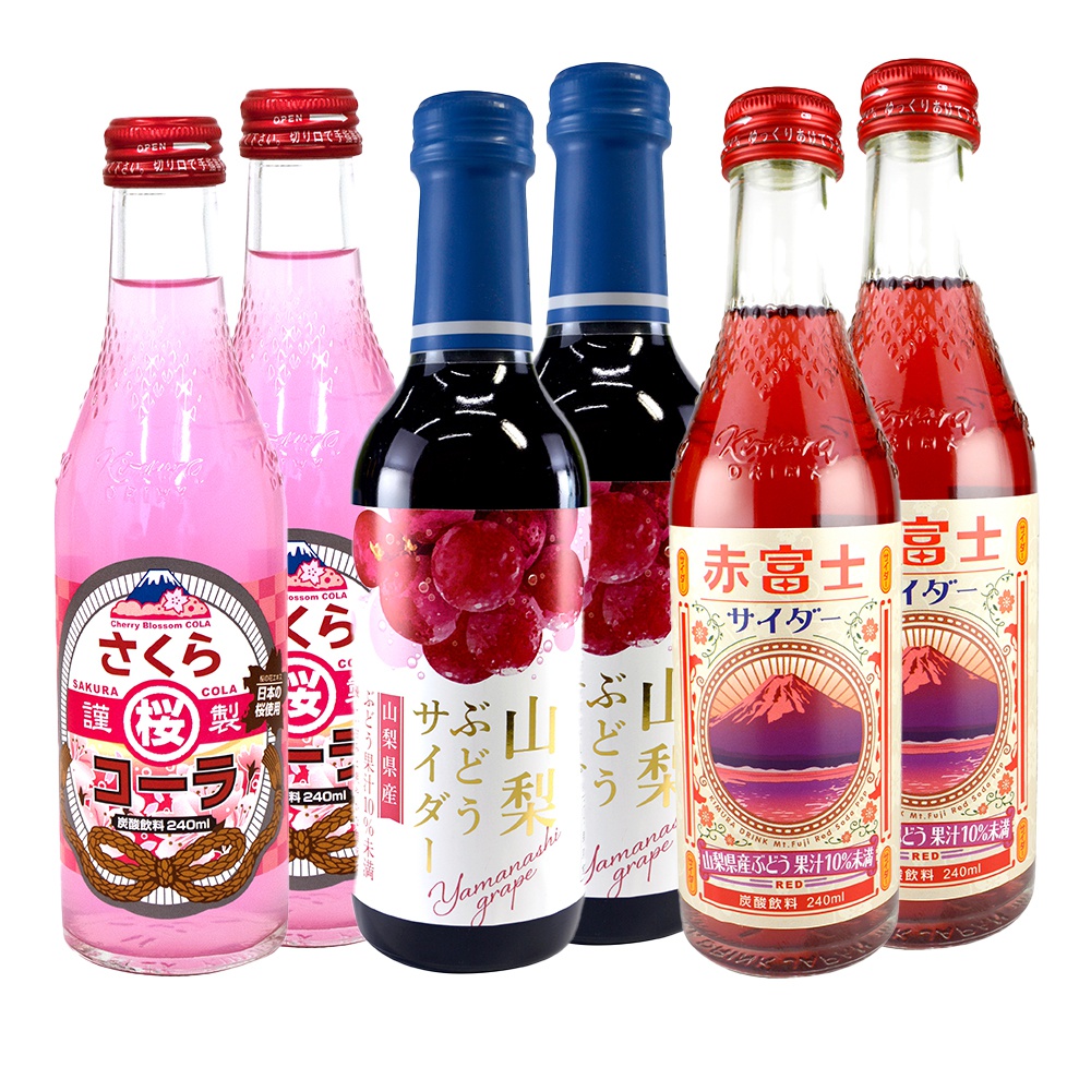 六瓶裝木村期間限定汽水，包含粉紅色櫻花可樂、深紫色山梨葡萄風味氣泡飲，以及紅色富士山蘋果風味氣泡飲，均為玻璃瓶裝，帶有紅色或藍色瓶蓋。