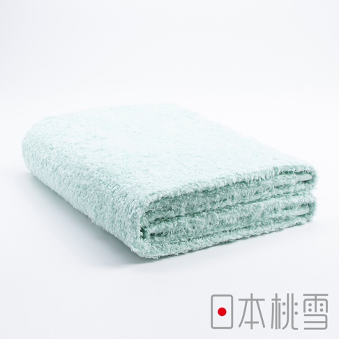 今治細絨浴巾，淺綠色，材質柔軟，厚實，折疊成兩層，放在白色背景上。