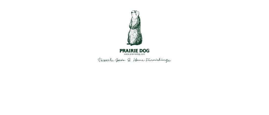 一隻站立的土撥鼠圖案，下方有 PRAIRIE DOG 字樣及網址，再下方是 Textile Goods & Home Furnishings 字樣。