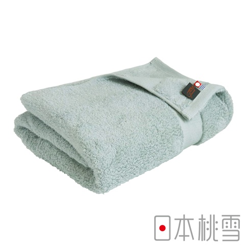 淺綠色今治匹馬棉浴巾，質地柔軟，帶有品牌標籤。