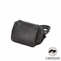 JETTER 方形托特包 CJTE-026，黑色皮革材質，包身底部有四個金屬腳釘，提把為圓形設計。