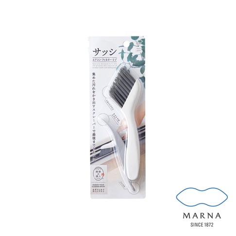 白色塑膠手柄的清潔刷，刷毛為深灰色，設計用於清潔縫隙，包含 V 型切口刷頭和刮刀。產品包裝上印有日文和英文說明。