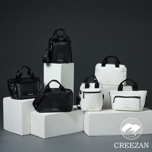 展示高爾夫方形側背包，有黑色與白色兩款。包身為壓紋皮革材質，配有提把及可拆卸肩帶。部分款式設有拉鍊口袋和品牌標誌。