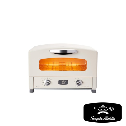 米白色復古多用途烤箱，配有銀色提把和玻璃門。內部烤網發出橘色暖光，正面有兩個旋鈕，標有溫度和時間設定，中央印有阿拉丁神燈標誌。