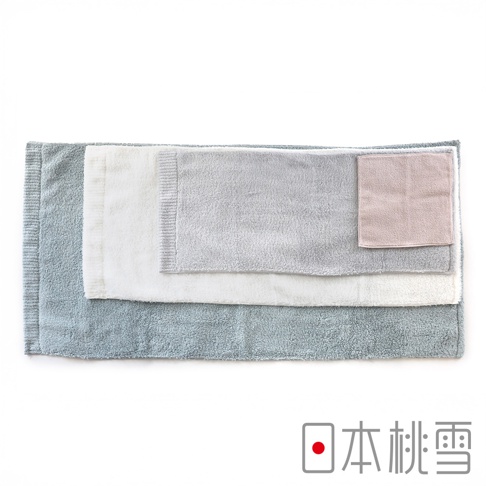 日本桃雪今治棉蕾超無撚蓬鬆浴巾，由藍色、白色、灰色及粉色毛巾堆疊而成