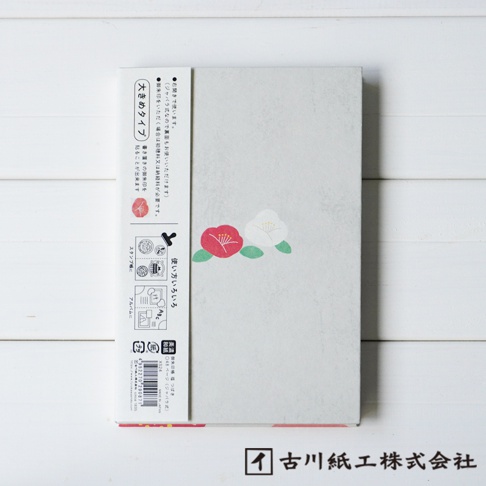 淺灰色和紙御朱印帳，封面印有紅色與白色的山茶花圖案，左側有日文說明文字與相關圖示。