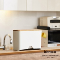 純白色長方體口罩收納盒，頂部配有淺木色原木蓋，側面下方有抽取開口。