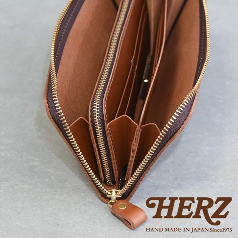 職人手作皮革Organ拉鍊長夾，展示其棕色皮革材質與多隔層內袋，配有金色拉鍊及同色系皮革拉頭。