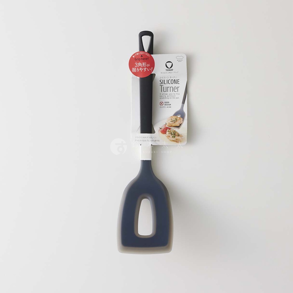 marna TRYANGIP 三角耐熱矽膠料理煎鏟，手柄處有「Grip here! 3角形 が 握りやすい！」字樣，強調其人體工學設計，方便抓握。