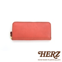 職人手作皮革經典拉鍊長夾，採用珊瑚橘色皮革，配有金色拉鍊與皮革拉頭，車縫線清晰，整體簡潔大方。