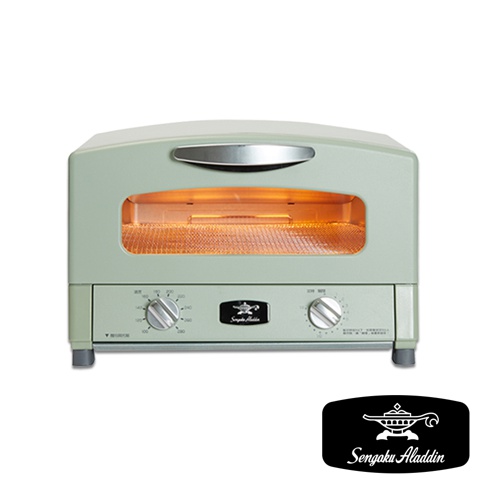 復古綠色多用途烤箱，帶有銀色把手和玻璃門，內部加熱管發光，下方有兩個旋鈕和品牌標誌。