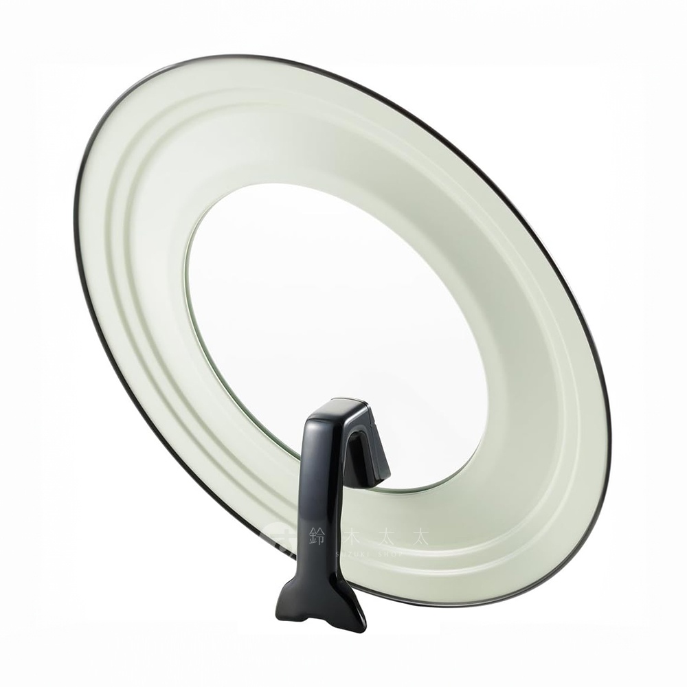 淺綠色強化玻璃鍋蓋，帶有黑色可立式把手，適用於 26-30 公分鍋具。