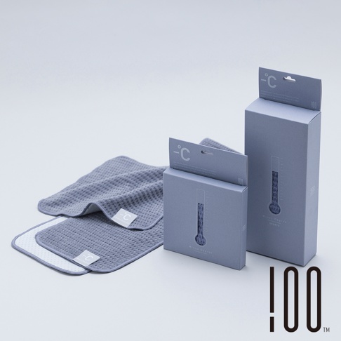 兩個灰色 Minus Degree 降溫涼感手巾，其中一個展開，另一個疊放在下方。兩款手巾皆為格子紋理，並帶有品牌標誌。產品以灰色紙盒包裝，紙盒上印有溫度計圖案，顯示品牌名稱及「SPORTS」。