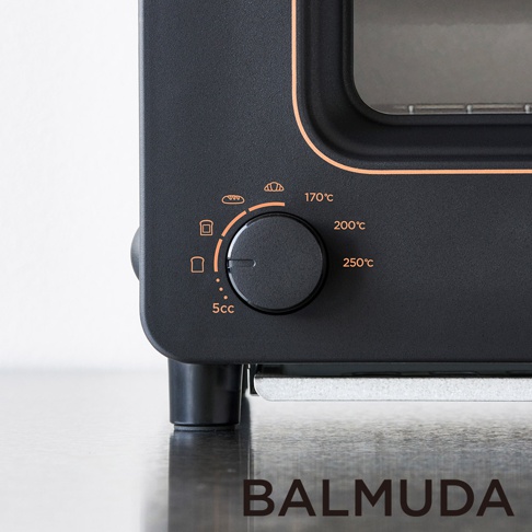 黑色蒸氣烤麵包機的近景，顯示帶有圖示和溫度設定（170°C、200°C、250°C）的黑色旋鈕，以及「5cc」字樣。