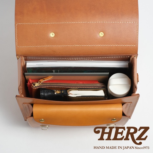 HERZ 品牌標誌，下方為 HAND MADE IN JAPAN Since1973 字樣。