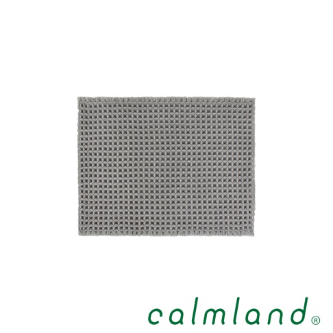 灰色鬆餅紋瞬乾吸水浴墊，材質柔軟，表面有立體紋理，邊緣有鬚鬚。