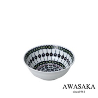 白色陶瓷湯碗，內側有黑色線條繪製的放射狀花卉圖案，花朵為紫色，搭配綠色圓點裝飾，底部有重複的花卉圖案。