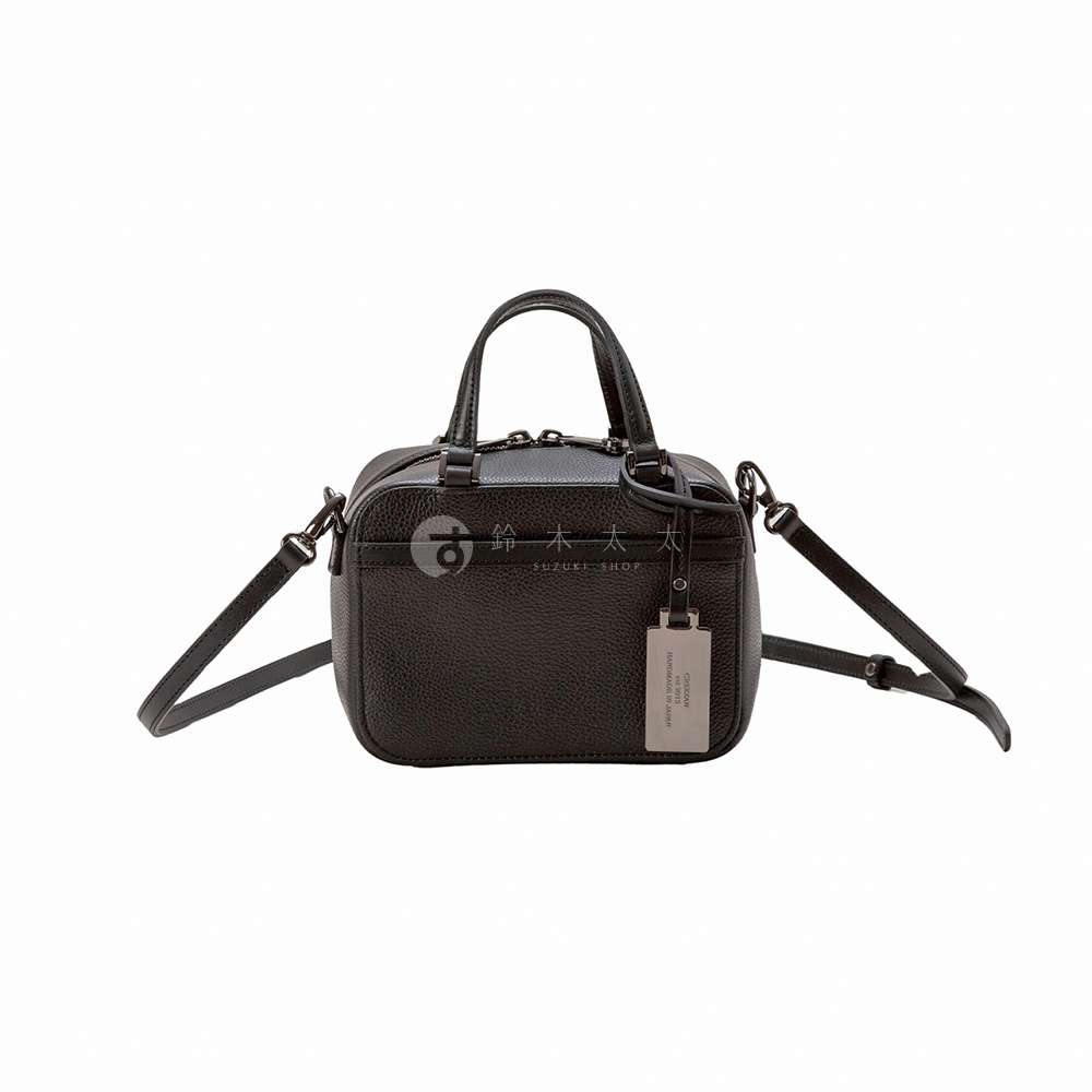 JETTER 迷你箱型包 CJTF-038，黑色皮革，配有頂部提把、可拆卸斜背帶及金屬品牌吊牌。