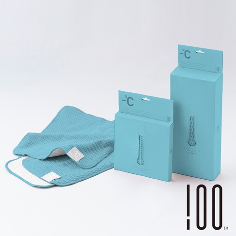 藍綠色 Minus Degree 降溫涼感毛巾，表面有蜂窩狀紋理，一角有白色標籤。旁邊是兩個相同色系的紙盒包裝，上面印有溫度計圖案和品牌名稱。