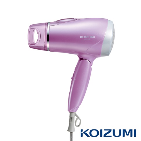 大風量負離子吹風機 KHD-9600，機身呈柔和的粉紫色，帶有金屬銀色飾環。吹風機前端為透明紫色，後端進風口為白色網狀設計。手柄處有開關按鈕，底部連接灰色電線。